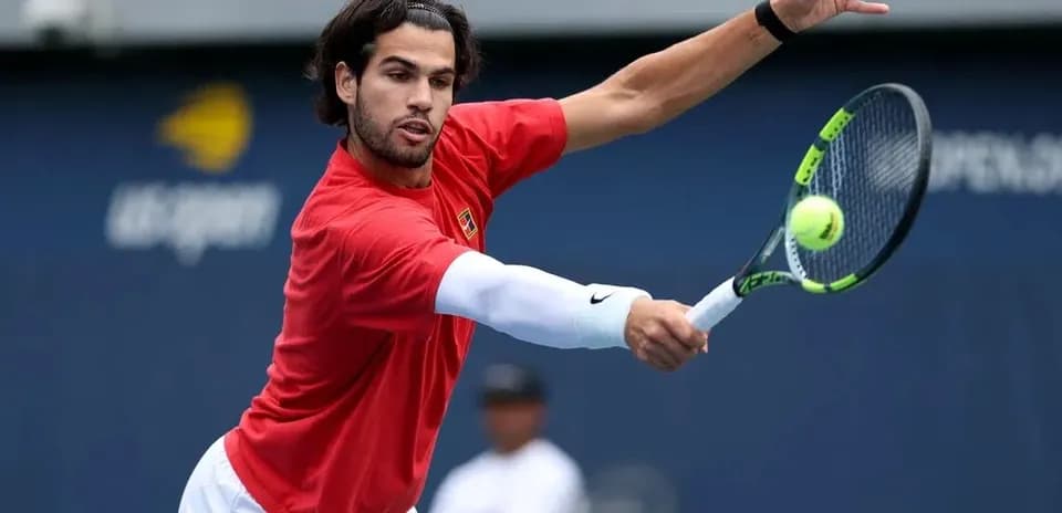 Player hitting a forehand during practice session