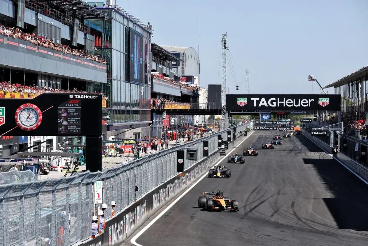 Formula 1 cars racing at circuit during event
