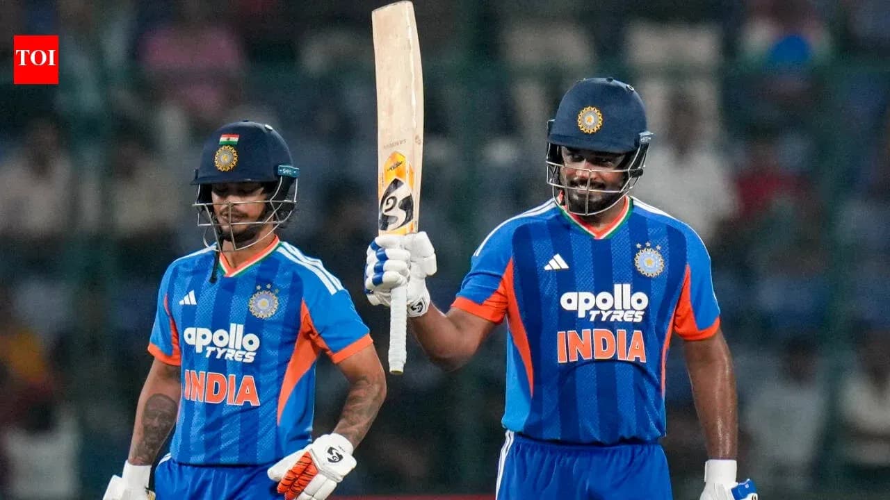 Two Indian cricketers celebrating a run during match