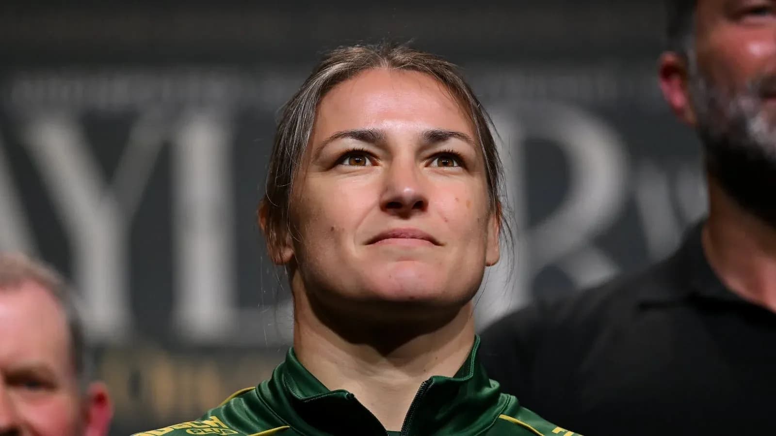 Athlete at weigh-in event, focused expression