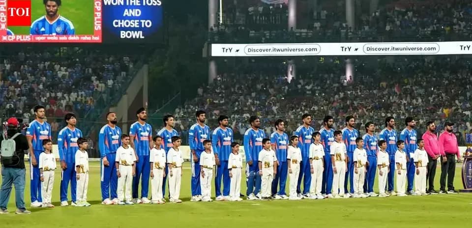 Cricket team and children standing before the match