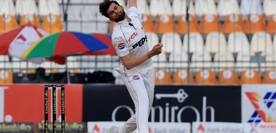 Bowler delivering a ball in a cricket match