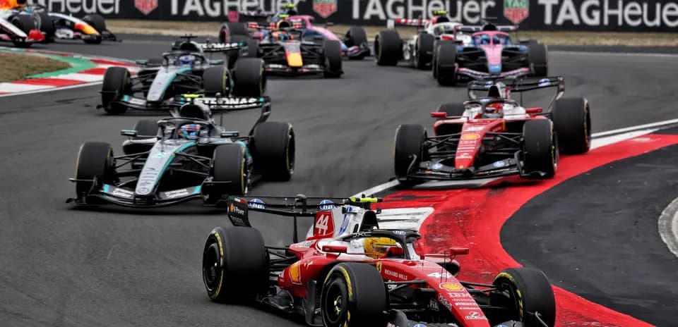 Formula 1 cars racing on track during event