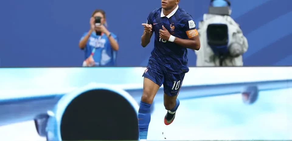 Player celebrating a goal on the field