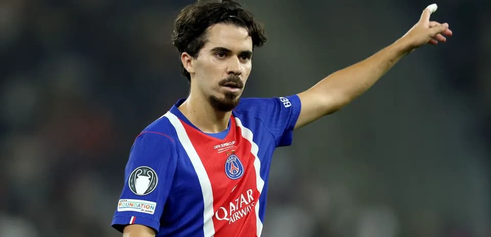 Player gesturing during a UEFA match for PSG