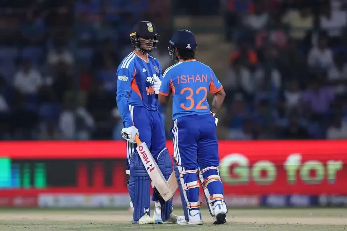 Two Indian cricketers discussing on the pitch