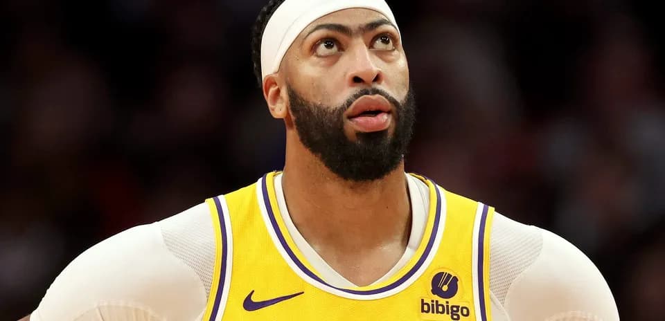 Player looking up during game wearing Lakers jersey
