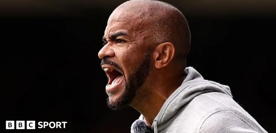 Coach shouting during a football match