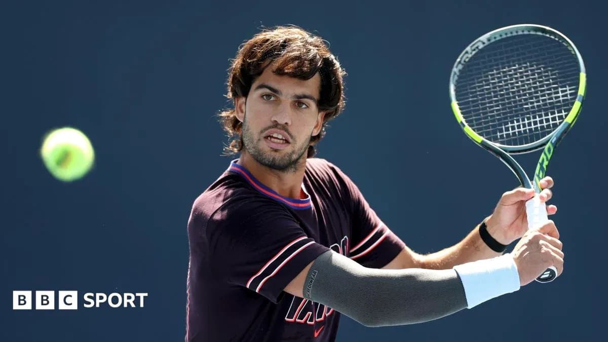 Player preparing to hit a tennis ball during match