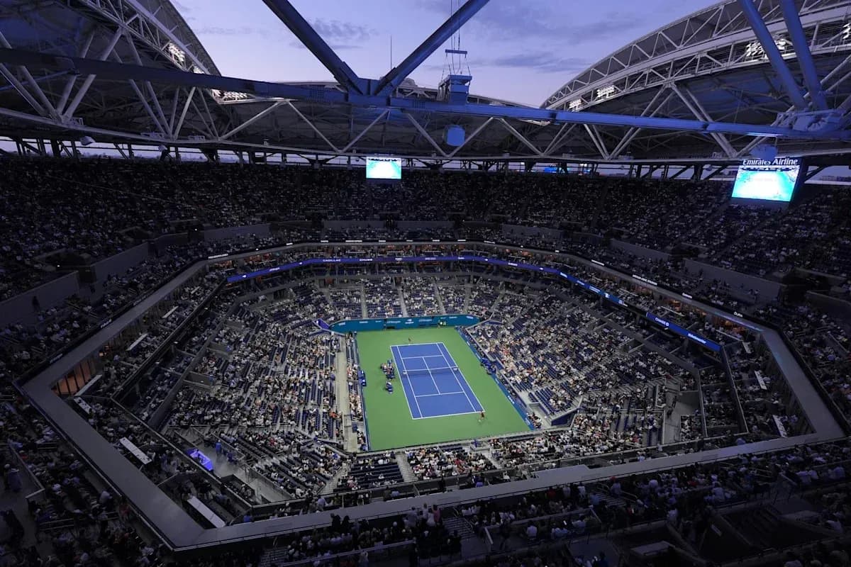 View of a tennis match at a packed stadium