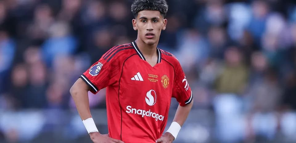 Young player in Manchester United jersey on field
