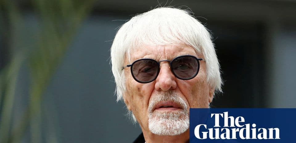 Person with white hair and sunglasses outdoors