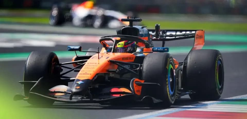 McLaren F1 car racing on track during event