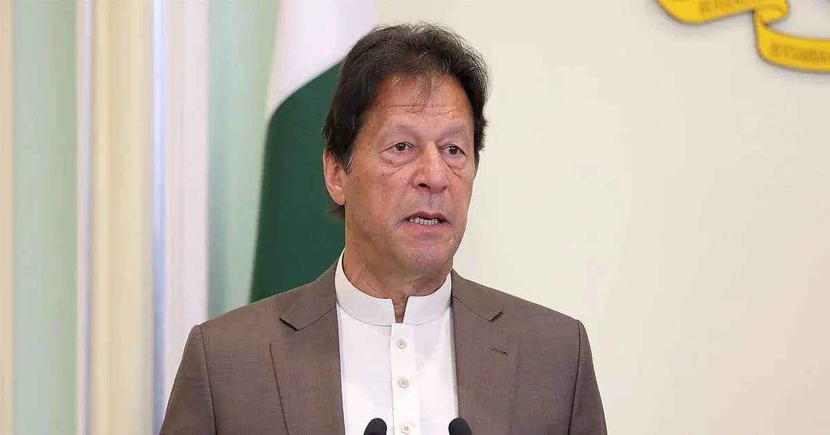 Person speaking at a podium with a flag behind