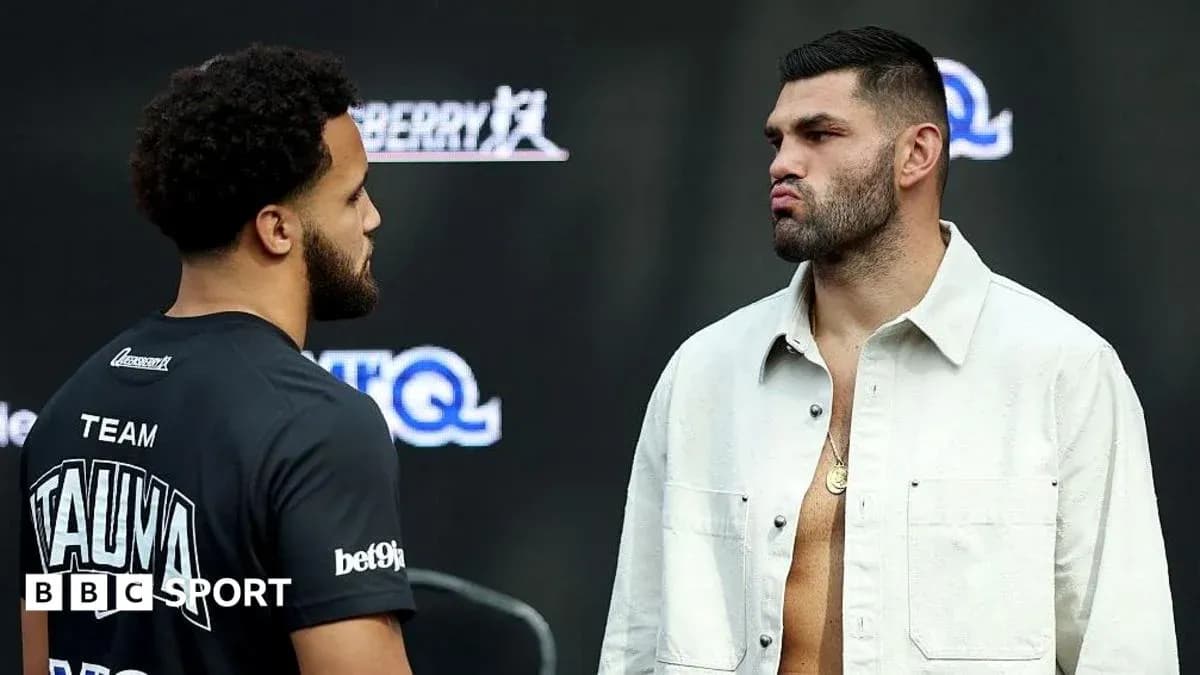 Two boxers facing off at press event