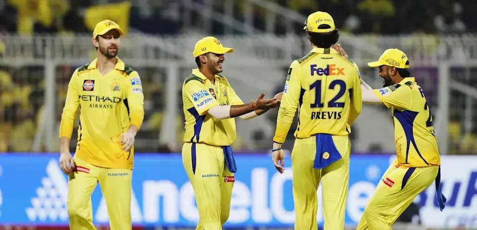 Chennai Super Kings players celebrating a wicket