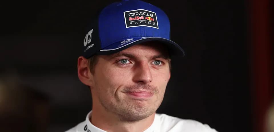 Driver wearing a blue cap during interview