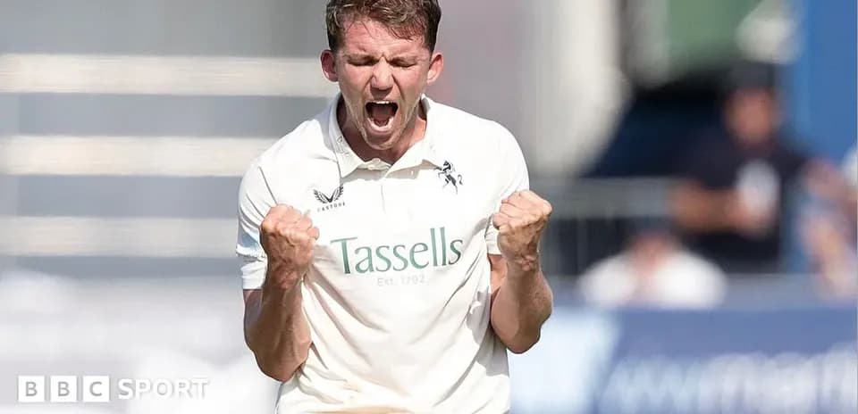Cricketer celebrating a wicket on the field