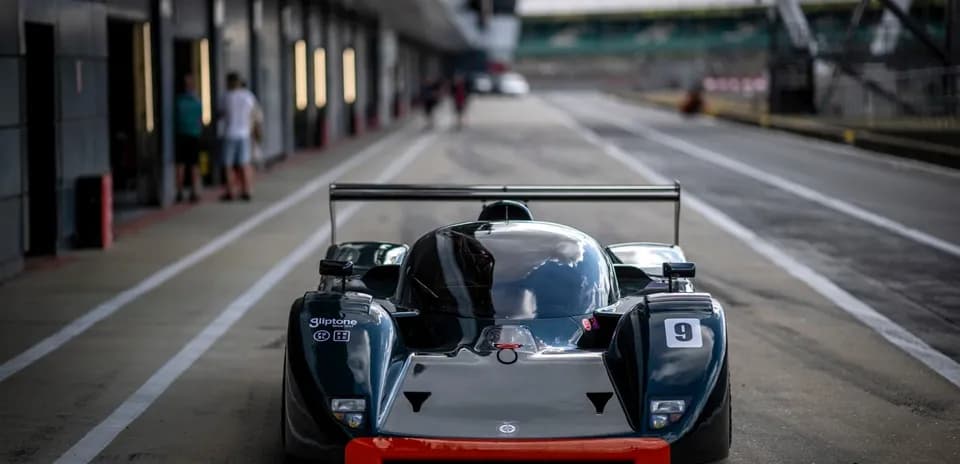 Race car in pit lane at motorsport event