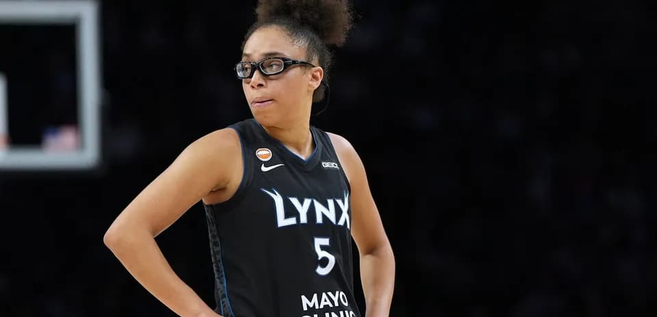 Player wearing Lynx jersey during basketball game