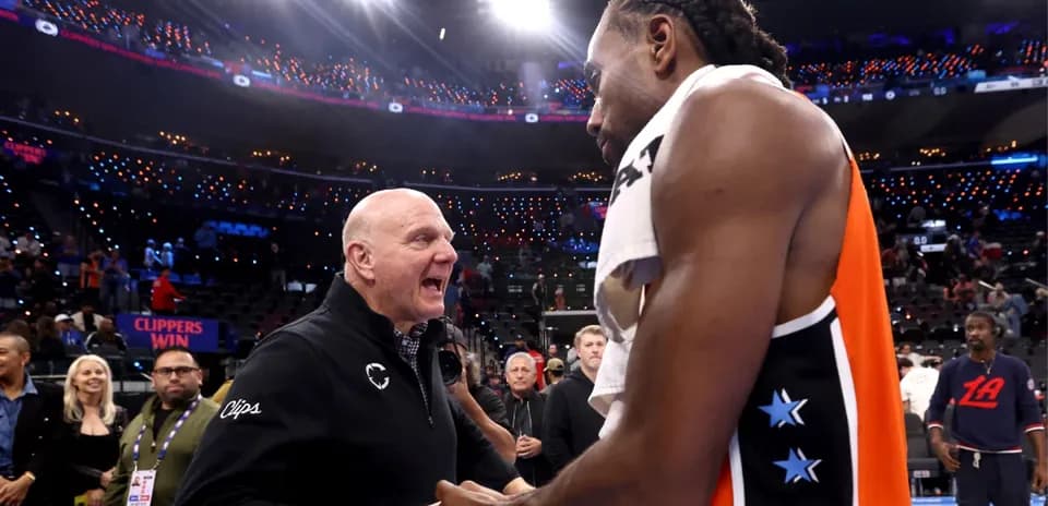 Steve Ballmer and Kawhi Leonard celebrating post-game