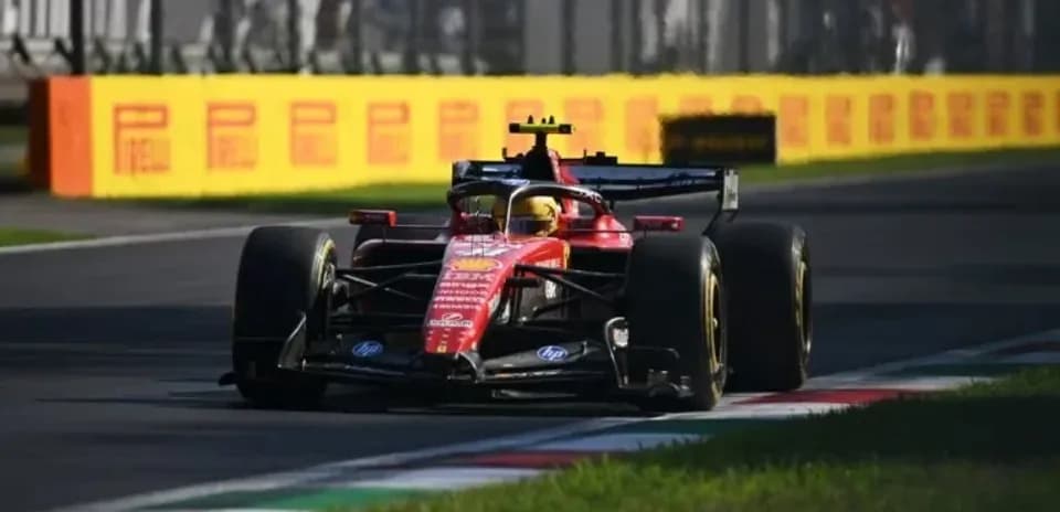 Ferrari car racing on track at Monza circuit