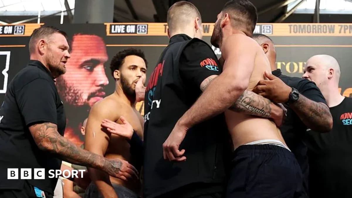 Two boxers face off during weigh-in event