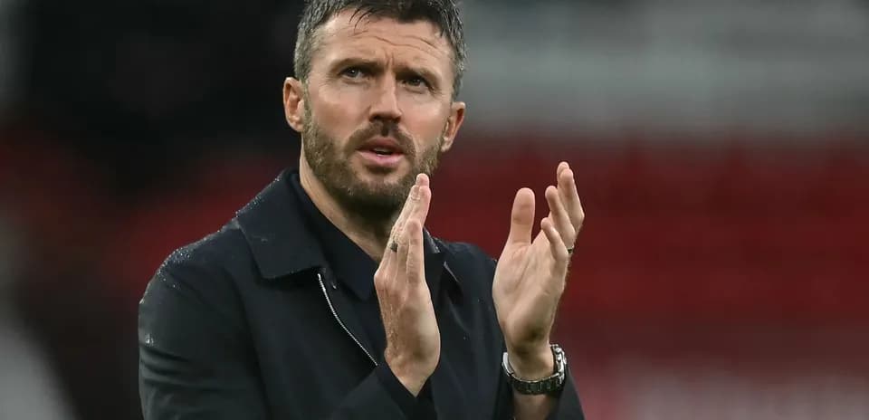 Coach applauding during a match