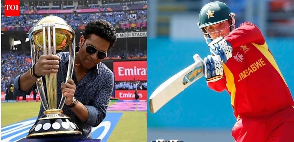 Cricket trophy held by player with bat in action