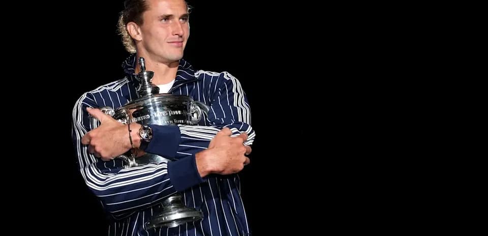 Player holding trophy during victory celebration