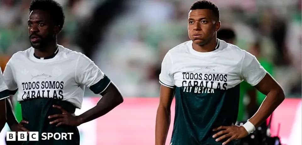 Players in warm-up shirts before match
