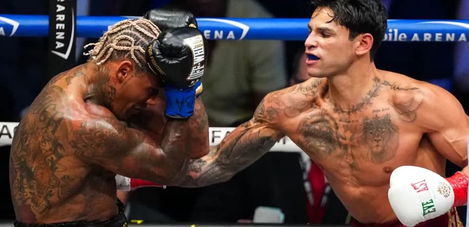 Two boxers exchanging punches in the ring