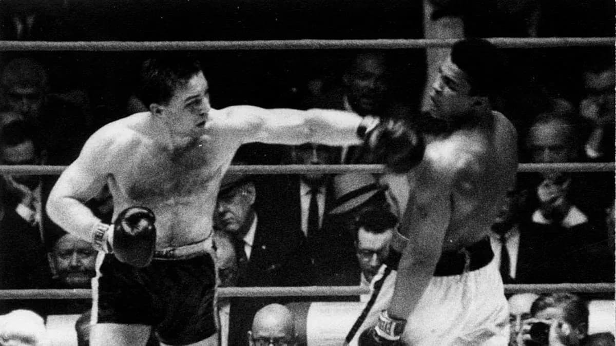 Boxers exchanging punches in the ring during match