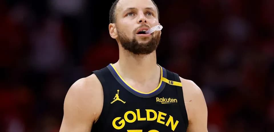 Player wearing Golden State jersey during game