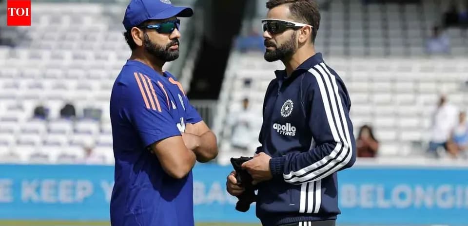 Rohit Sharma and Virat Kohli talking during practice