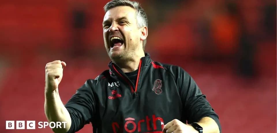 Coach celebrating passionately after a match