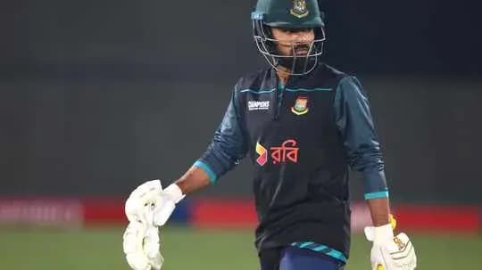 Cricketer wearing gloves during practice session