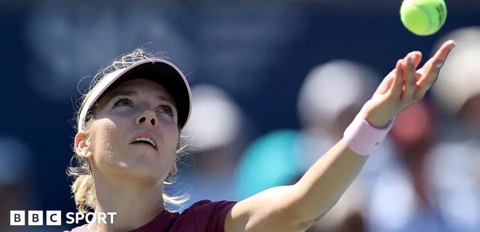 Tennis player serving during a match