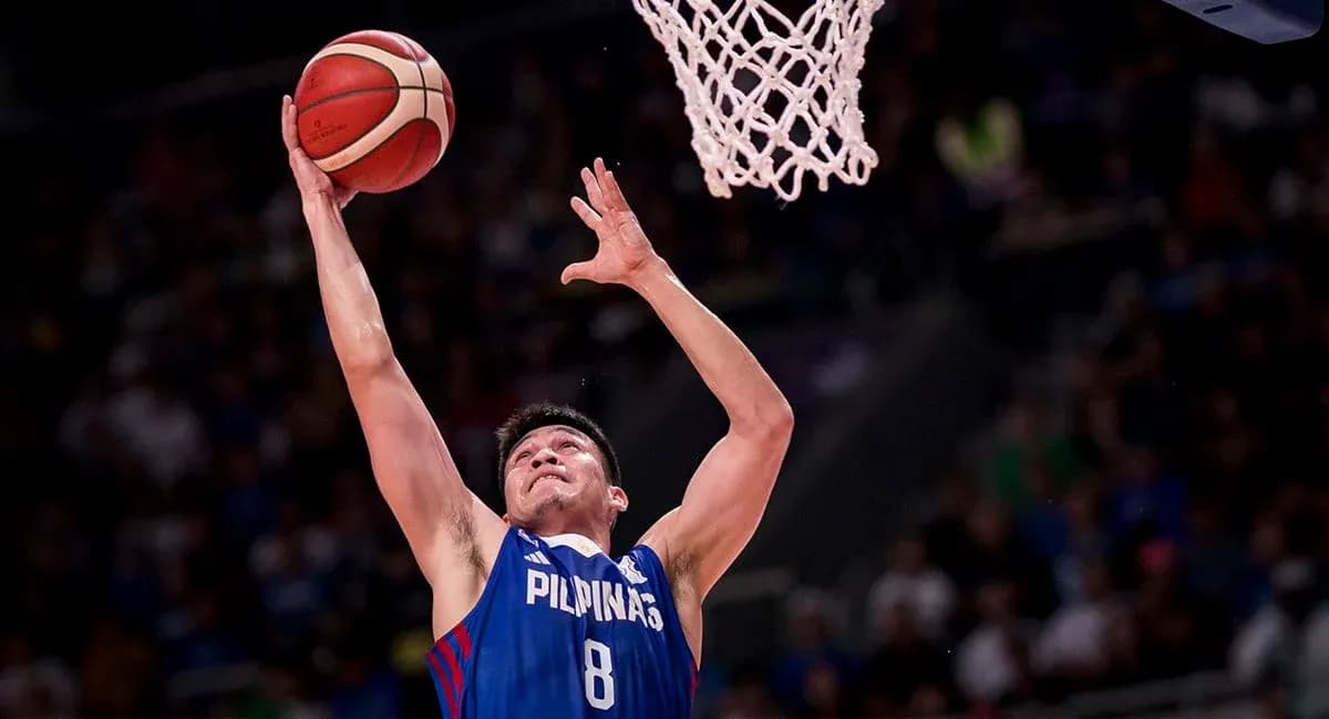 Player shooting the basketball towards the hoop
