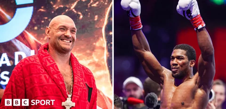 Tyson Fury and Anthony Joshua posing for fans