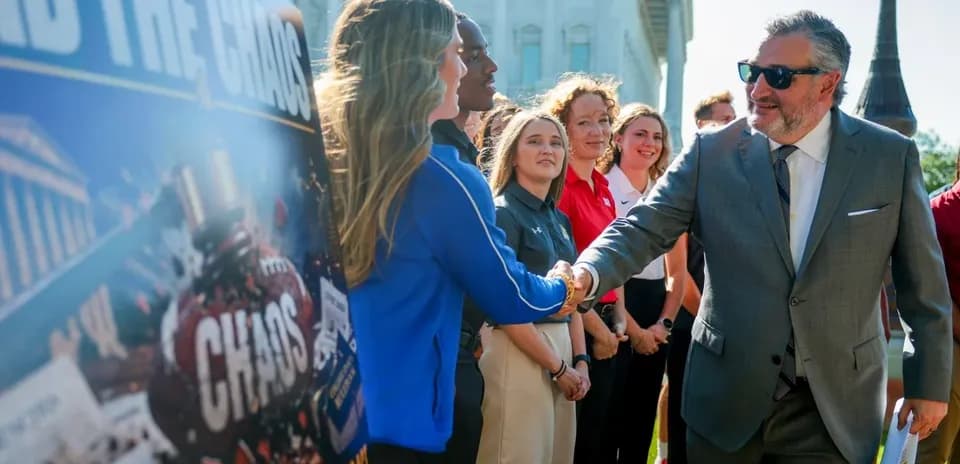 Politician shaking hands with young athletes at event