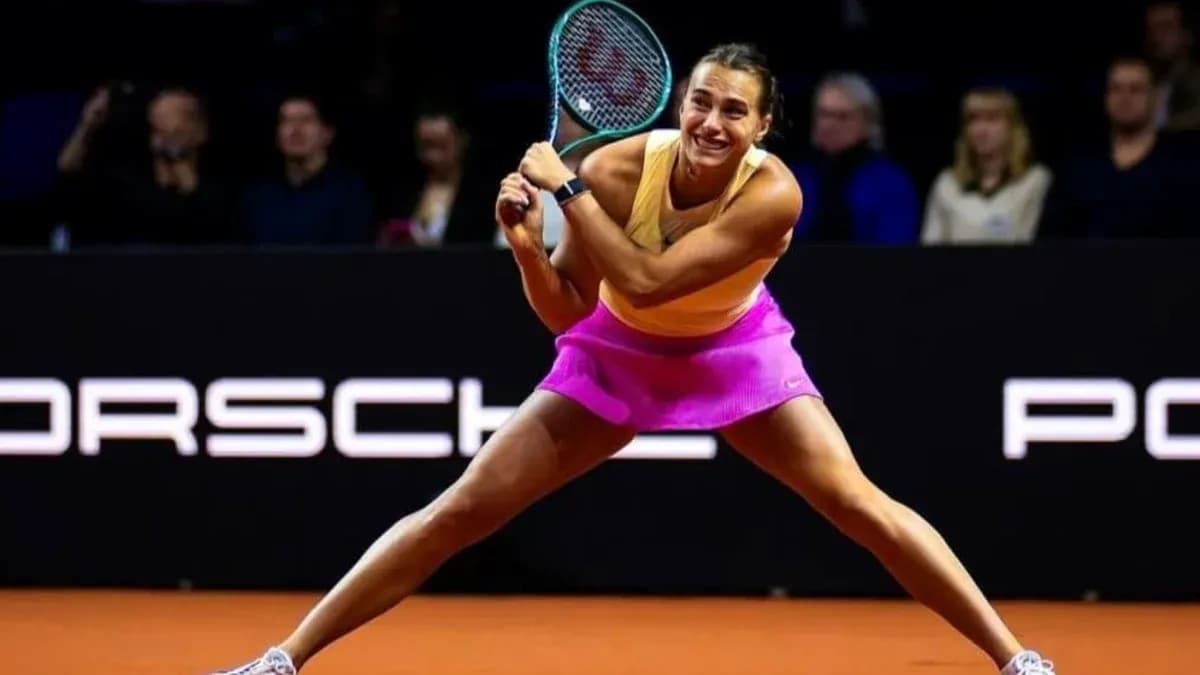 Tennis player hitting a forehand during match