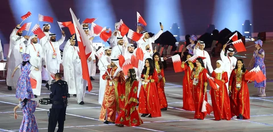 Bahrain team celebrating with flags at event