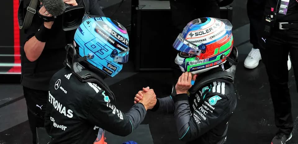 Two Formula 1 drivers shaking hands post-race