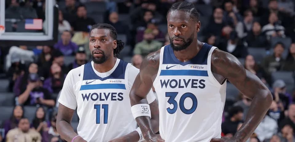 Two players from Minnesota Timberwolves on court