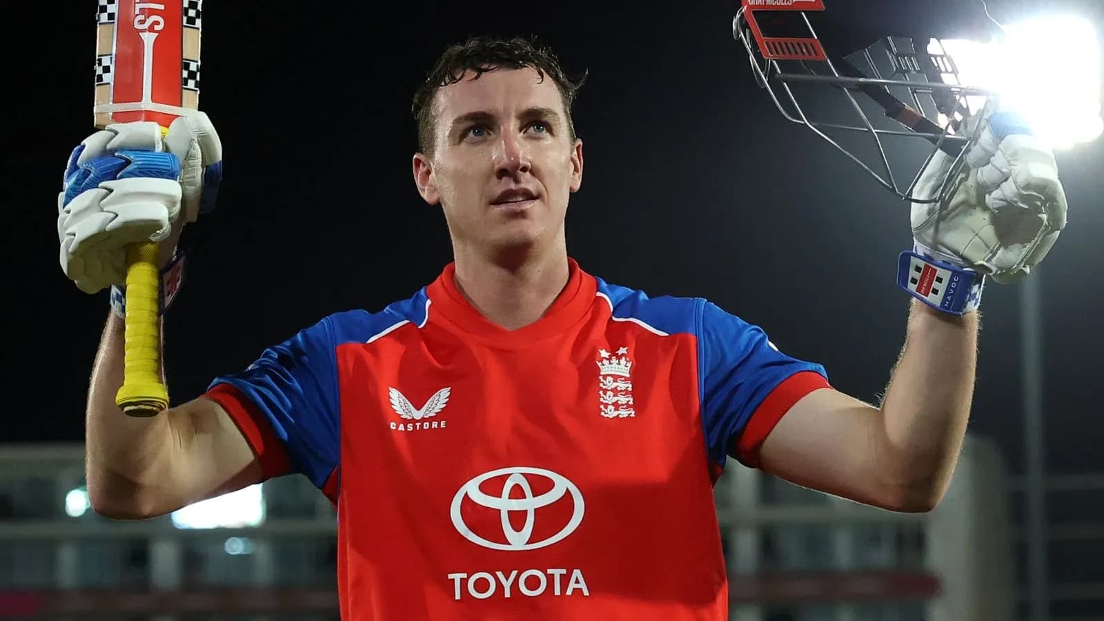 Batter celebrating after scoring a century in match