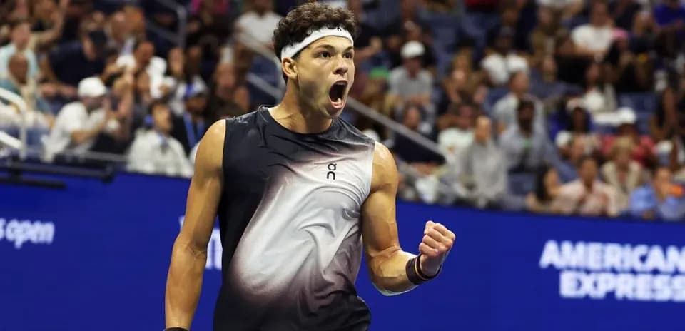 Player celebrating after winning a point at US Open
