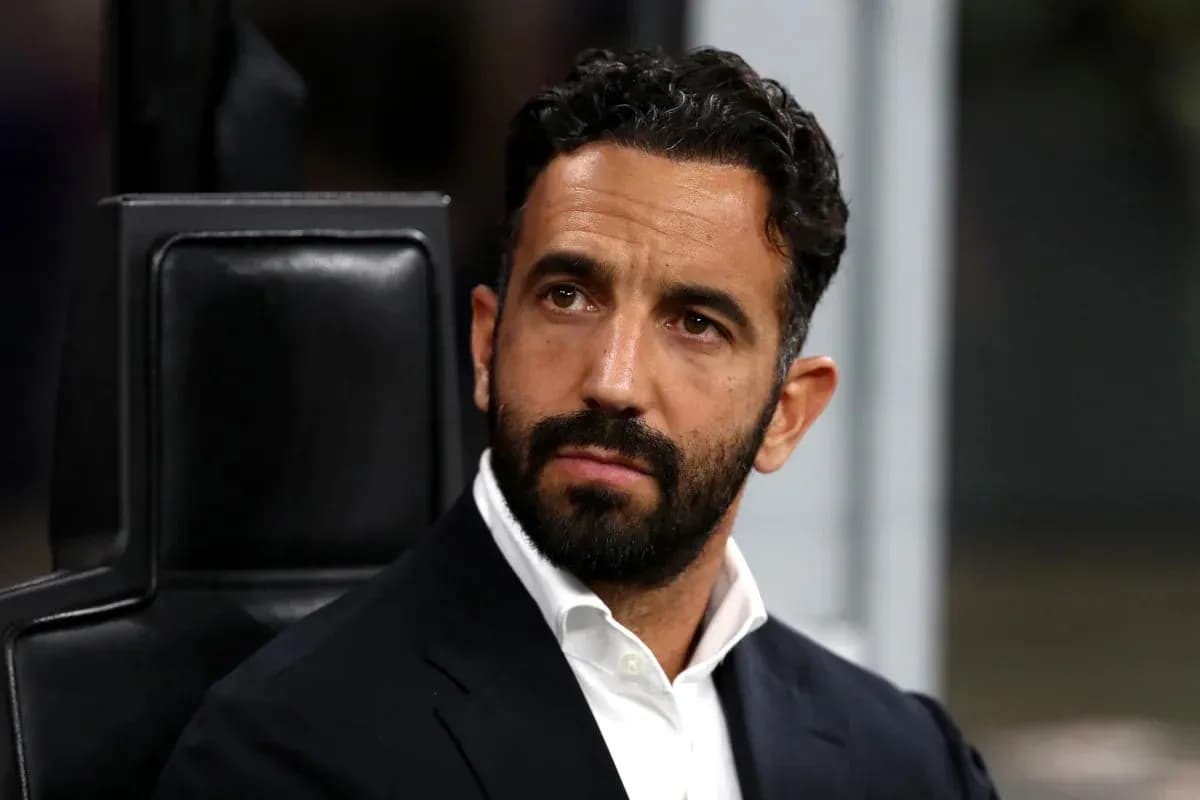 Coach sitting on bench during a match