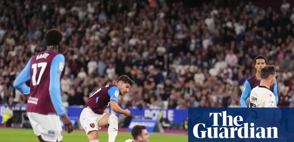 West Ham players celebrating a goal in stadium