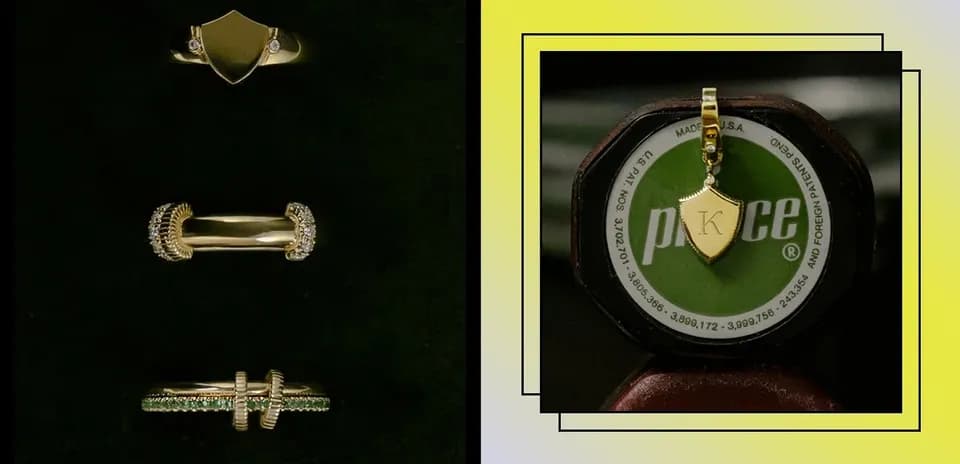 Various gold rings and a pendant displayed together